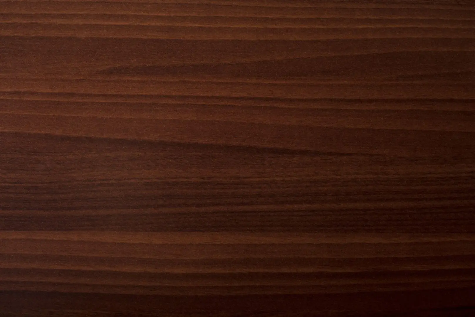 A close up of the wood grain on a table