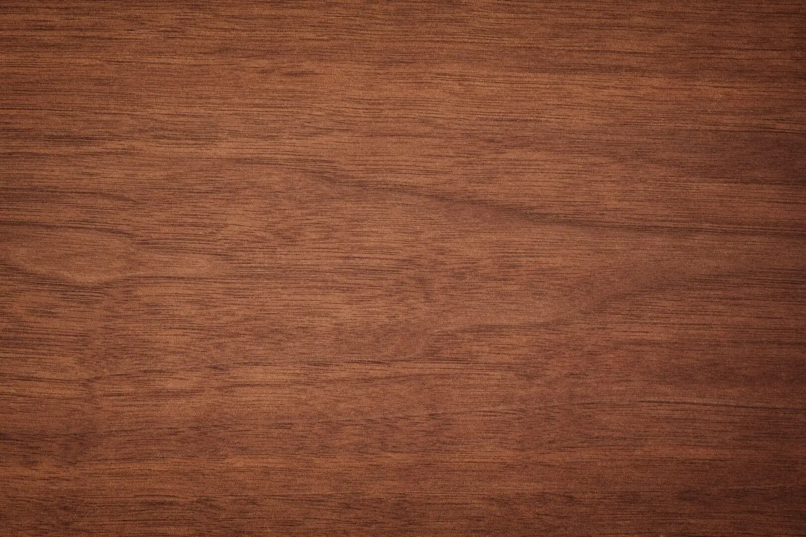 A close up of the wood grain on a surface