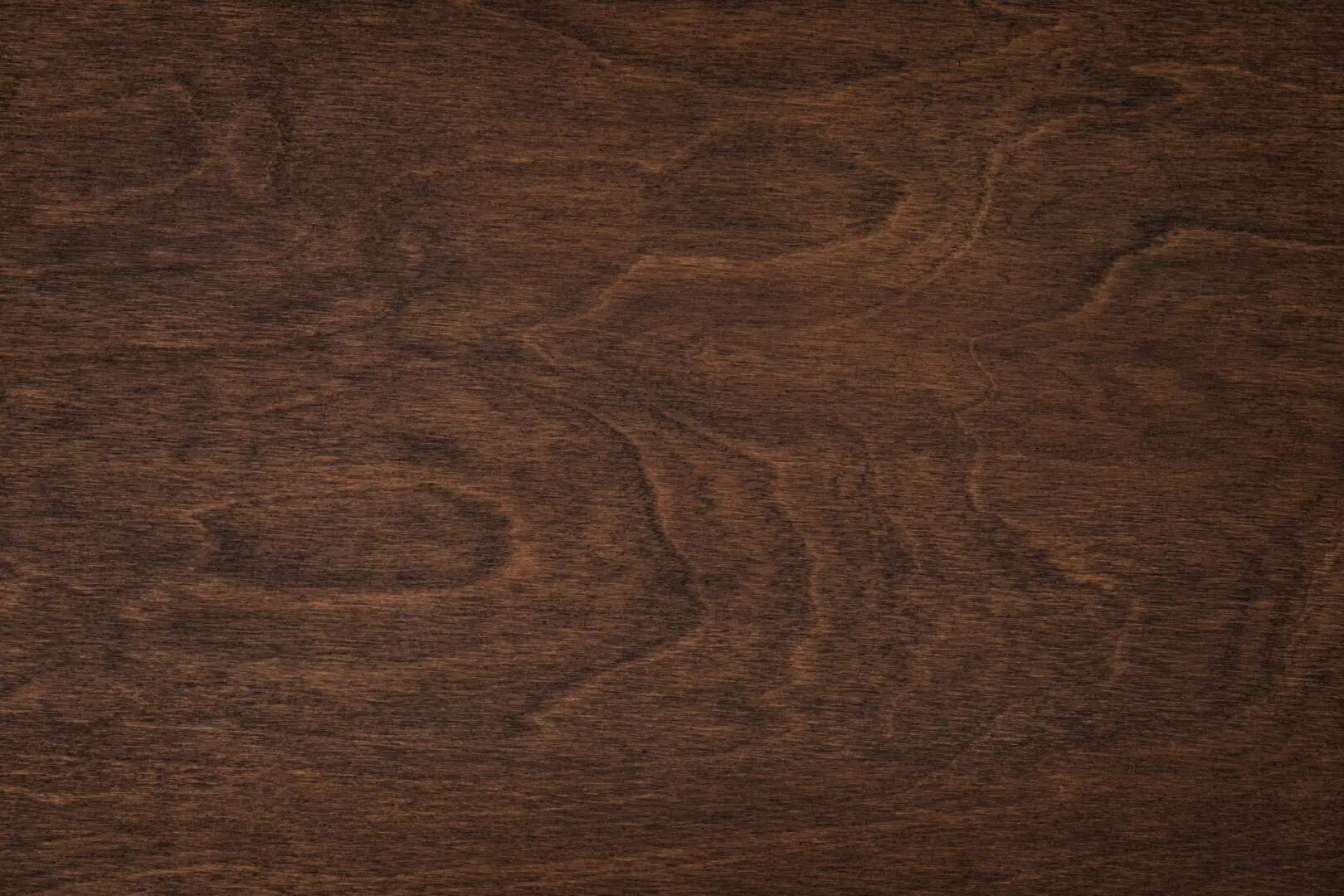 A close up of the wood grain on a surface