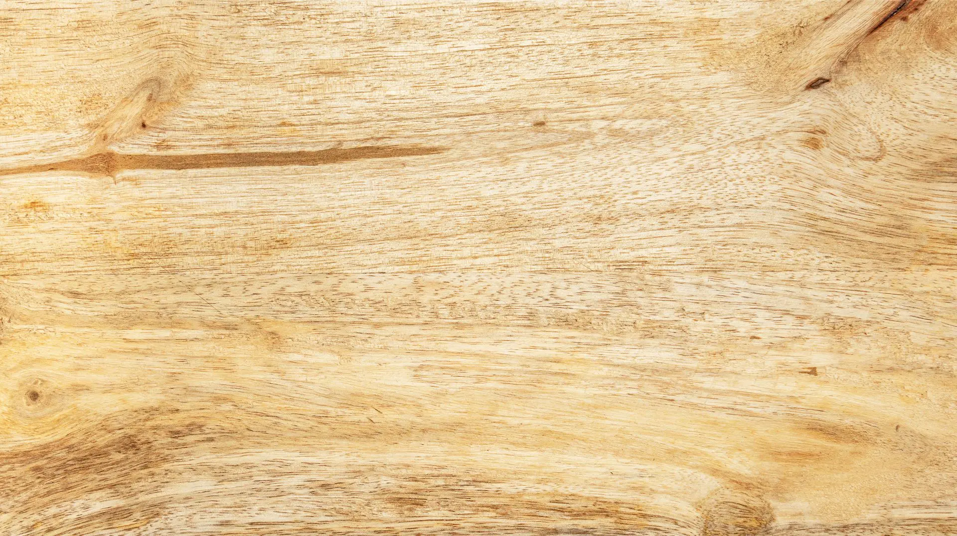 A close up of the wood grain on a table