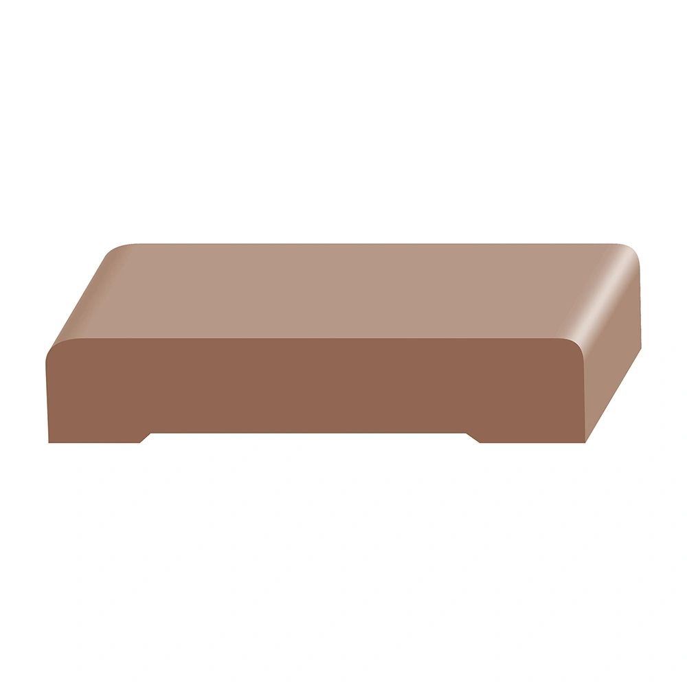 A brown block sitting on top of a white table.