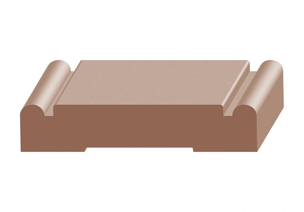 A brown piece of plastic sitting on top of a table.