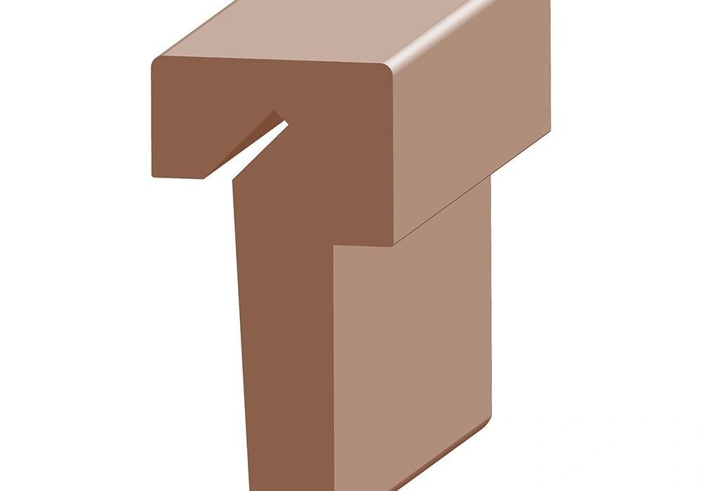 A brown piece of wood with the letter t