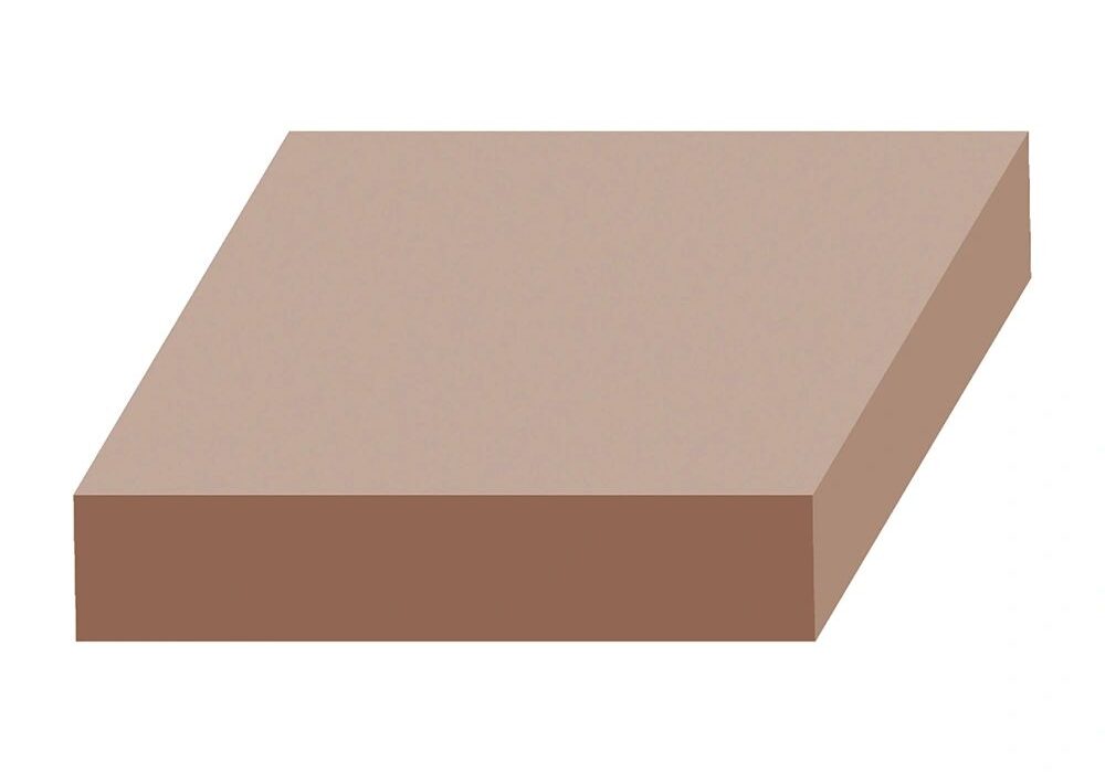 A brown square is sitting on top of the floor.